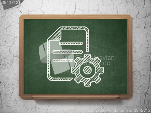 Image of Database concept: Gear on chalkboard background