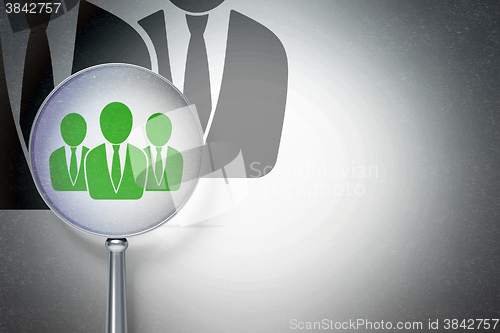 Image of News concept:  Business People with optical glass on digital background