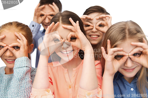 Image of happy children making faces and having fun