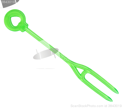 Image of green canape fork