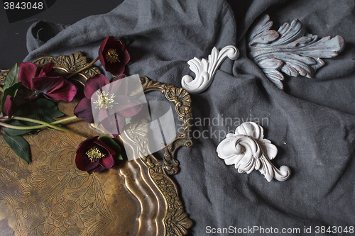 Image of Ancient copper tray and flowers