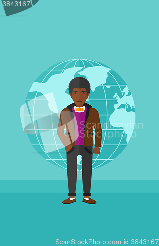 Image of Businessman standing on globe background.