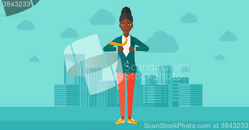 Image of Business woman taking off jacket.