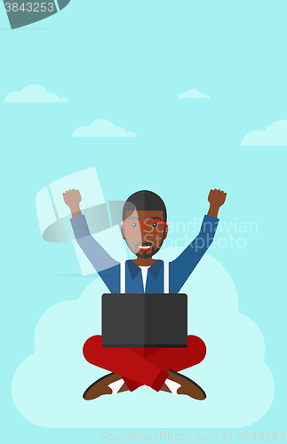 Image of Man sitting on cloud with laptop.
