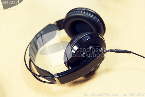 Image of headphones at recording studio or radio station