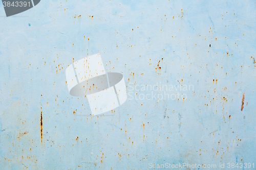 Image of Old blue cracked paint on metal background