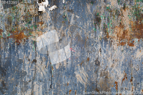 Image of Old blue cracked paint on metal background