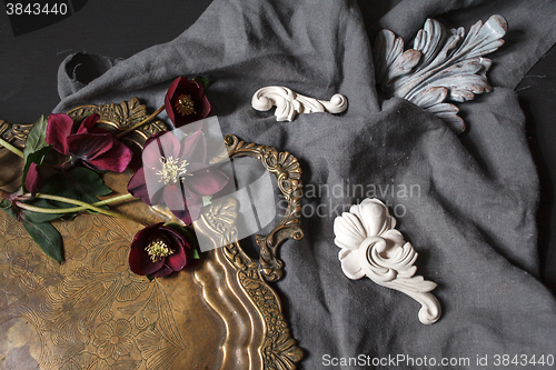 Image of Ancient copper tray and flowers