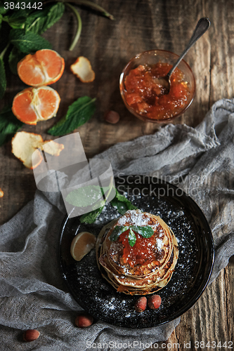 Image of The natural mandarin jam on wooden table