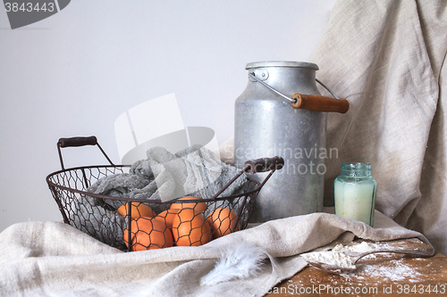 Image of Ingredients for a cake on a white cotton fabric