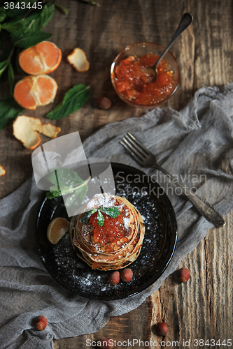 Image of The natural mandarin jam on wooden table