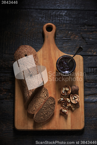 Image of The top view of fruity jam on black wooden table