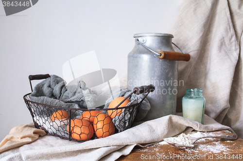 Image of Ingredients for a cake on a white cotton fabric