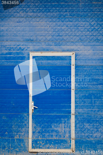 Image of Blue door to garage
