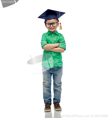 Image of happy boy in bachelor hat or mortarboard