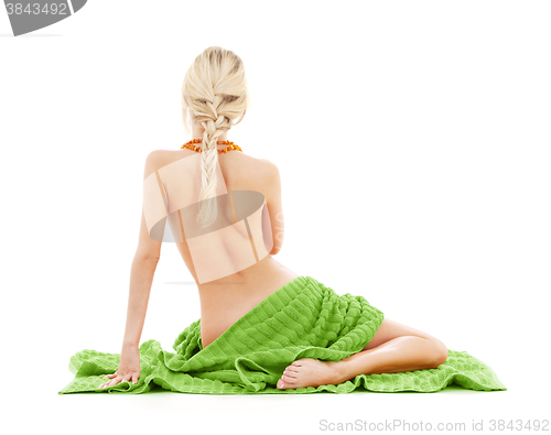 Image of beautiful bare woman with green towel