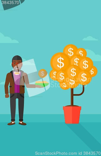 Image of Man catching dollar coins.