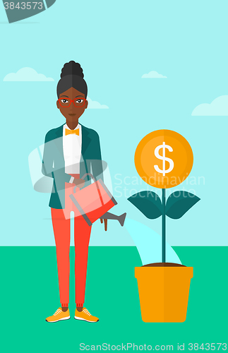 Image of Woman watering money flower.