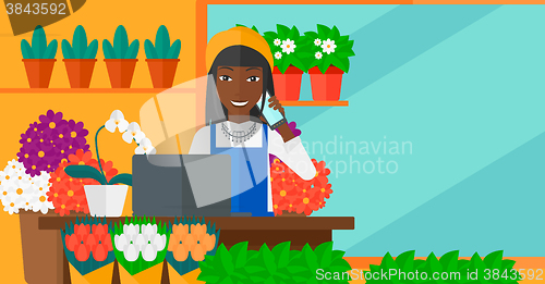 Image of Florist taking order.