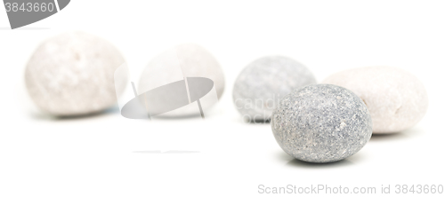 Image of round stones on white