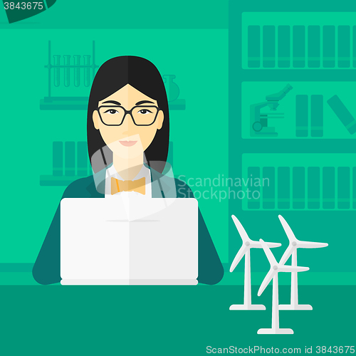 Image of Woman working at laptop. 