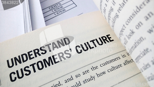 Image of Understand customer culture word on the book 