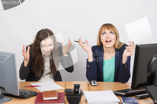 Image of Two employee in the office and express rabost relief