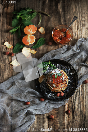 Image of The natural mandarin jam on wooden table