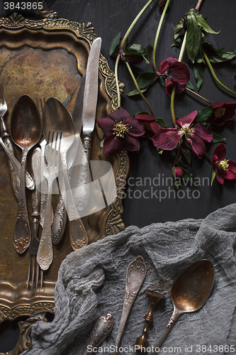 Image of Old vintage ornamented cutlery and antique nickel copper tray 