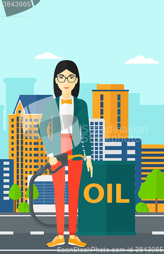 Image of Woman with oil can and filling nozzle.