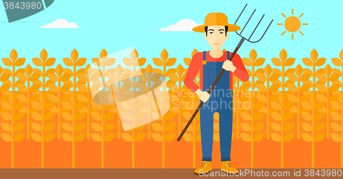 Image of Farmer with pitchfork.