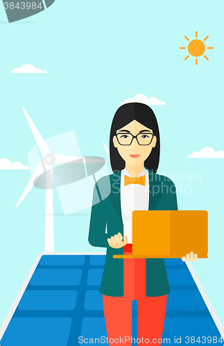 Image of Woman using laptop.