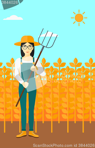 Image of Farmer with pitchfork.