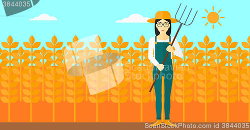 Image of Farmer with pitchfork.