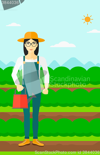 Image of Farmer with watering can.