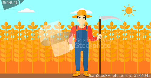 Image of Farmer on the field with scythe.