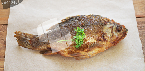 Image of fried fish on paper
