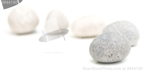 Image of round stones on white