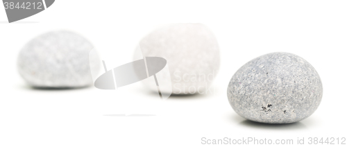 Image of round stones on white