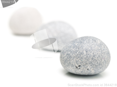 Image of round stones on white