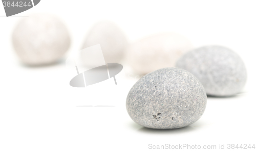 Image of round stones on white