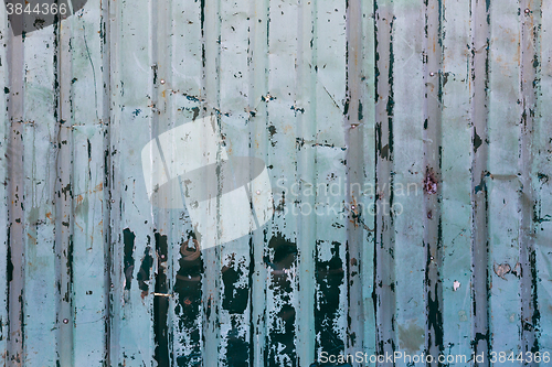 Image of Old green cracked paint on metal background