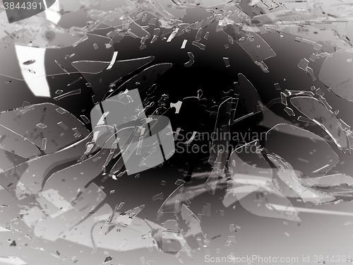 Image of Shattered and breaking glass on grey with shallow DOF