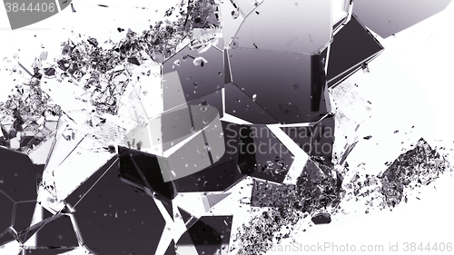 Image of Pieces of smashed cracking glass on white