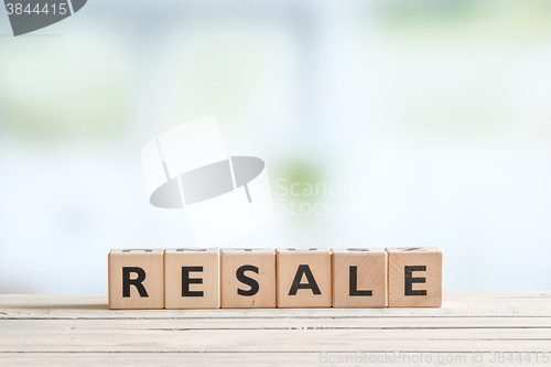 Image of Resale sign on a wooden desk