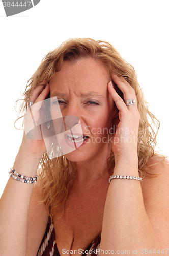 Image of Closeup of woman with headache.