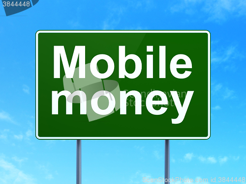 Image of Currency concept: Mobile Money on road sign background