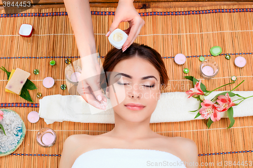 Image of Beautiful young woman at a spa salon