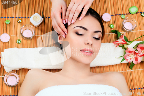 Image of Beautiful young woman at a spa salon