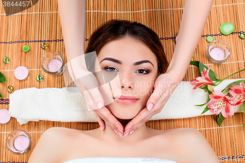 Image of Beautiful young woman at a spa salon